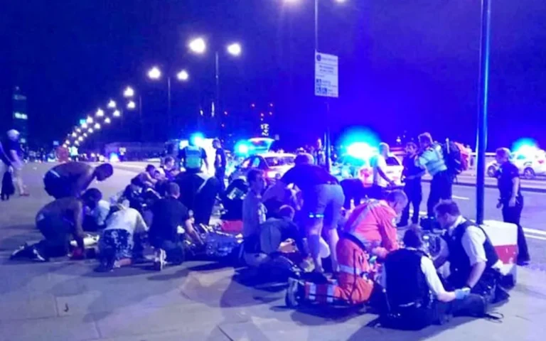 A photo of the London Bridge area with a police cordon in place. The image shows a number of police officers and vehicles at the scene. The London Bridge attack was a devastating incident that resulted in the loss of eight lives. The officer who was sacked was part of the response team that attended the scene and was hailed as a hero for his bravery.