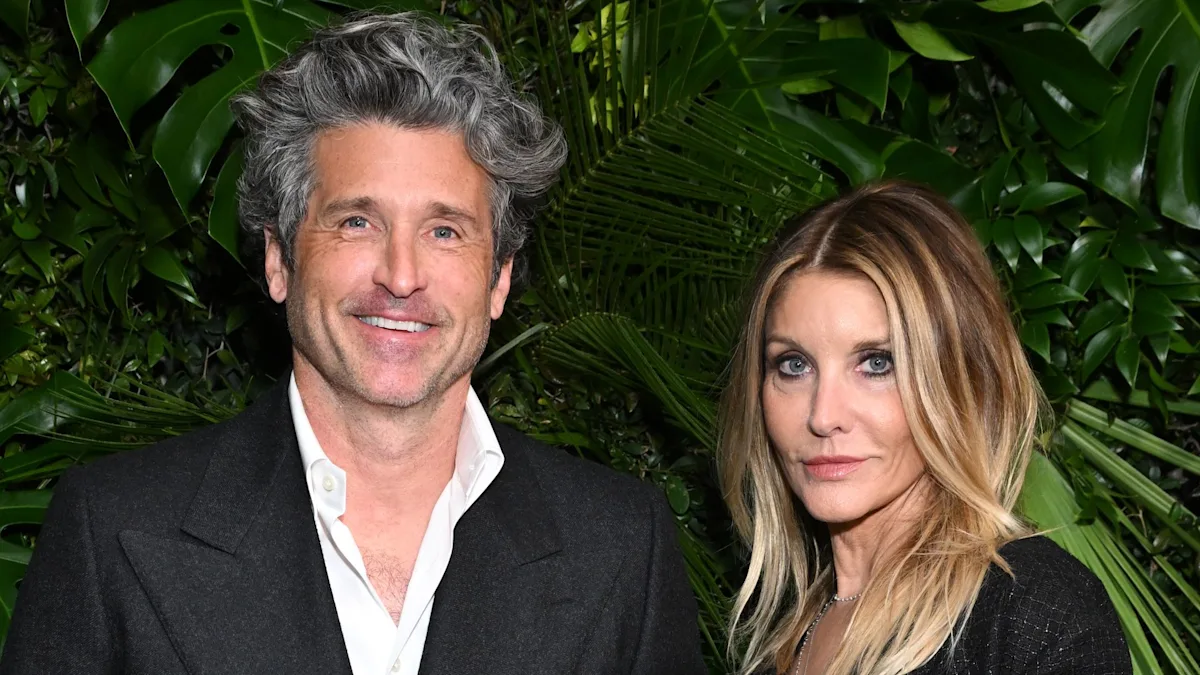 Patrick Dempsey and his wife, a couple who have been married for 27 years, posing together at a red carpet event, showcasing their enduring love and commitment to each other, a true Hollywood power couple