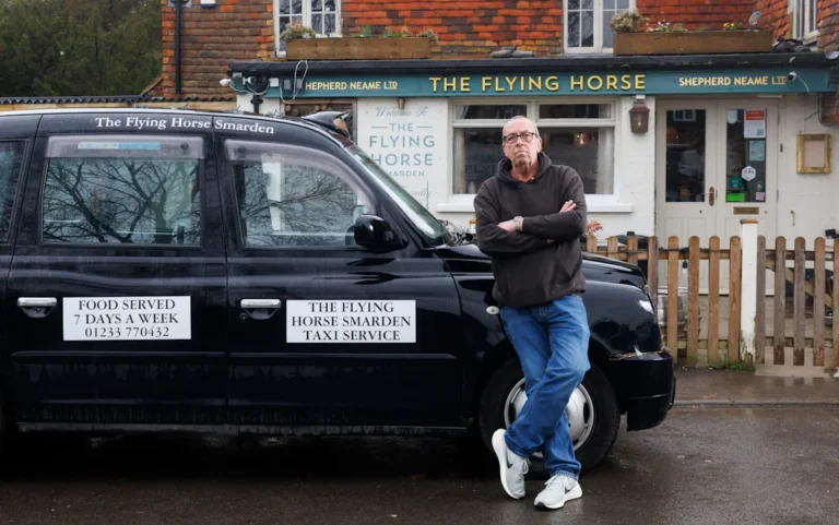A photo of a pub at night with a taxi parked outside, highlighting the issue of customer safety and the importance of responsible behaviour from licensed premises, with a focus on the primary keyword of pub ban