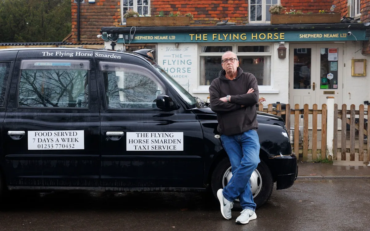 A photo of a pub at night with a taxi parked outside, highlighting the issue of customer safety and the importance of responsible behaviour from licensed premises, with a focus on the primary keyword of pub ban