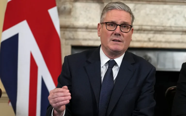 A photo of Keir Starmer speaking at a political event, with a crowd of voters in the background, analysing his behaviour and policies as the Labour leader faces criticism and backlash ahead of the UK by-election