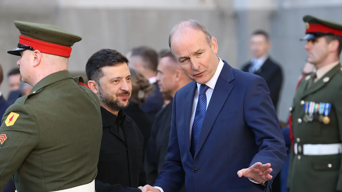 The European Union and Ukraine flags waving together in the wind, symbolising unity and cooperation, with a focus on the EU loan for Ukraine, a vital step in helping the country recover from conflict