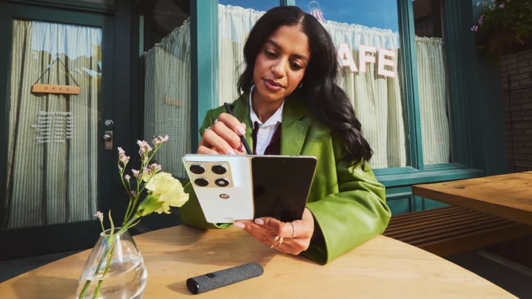 The Motorola Razr Fold, a foldable phone with a 6.56-inch cover screen and an 8.09-inch internal display, featuring a triple-50Mp camera set-up and 122-degree ultrawide, available in the UK market as a more affordable option