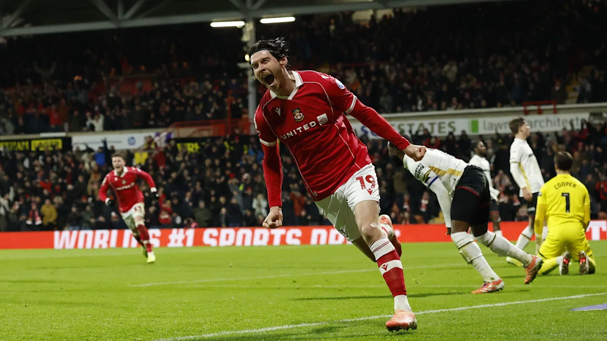 Kieffer Moore scores against former team