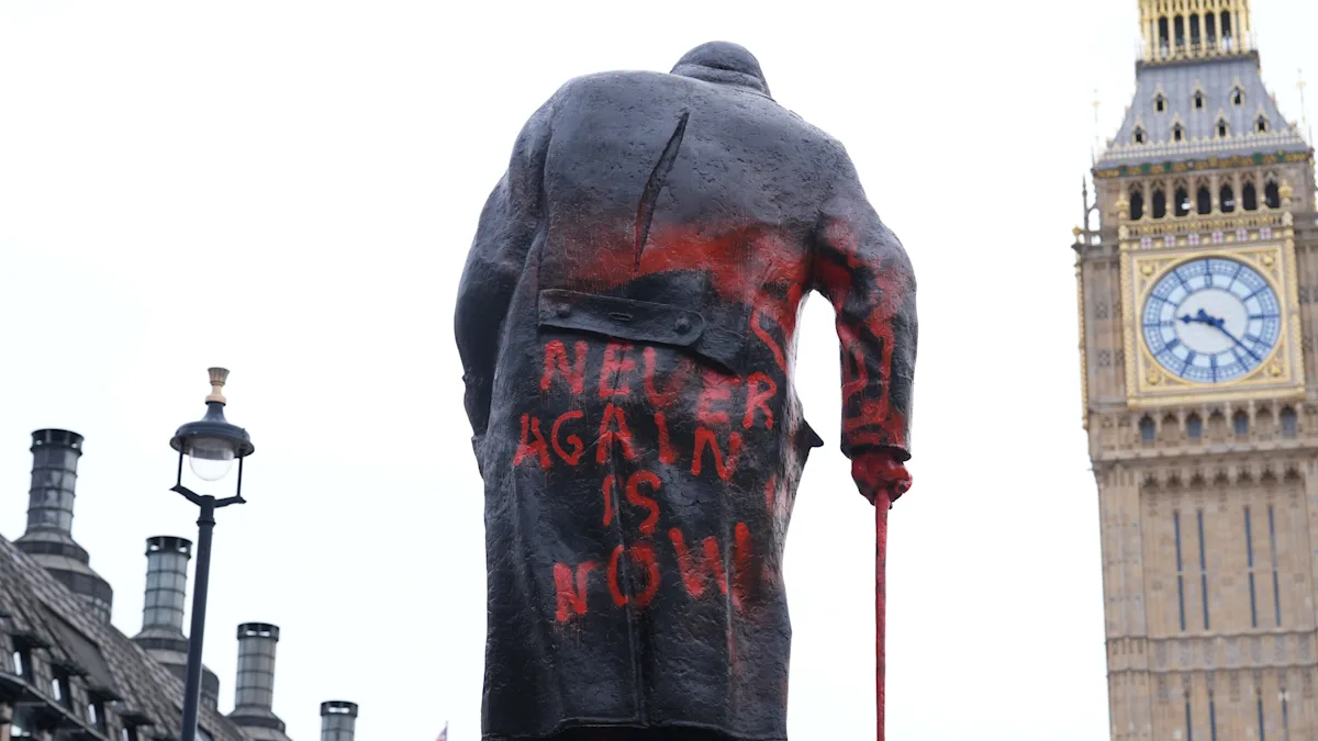 The Winston Churchill statue defaced with graffiti, a shocking display of destructive behaviour and vandalism, highlighting the need for increased security measures to protect public monuments and preserve history