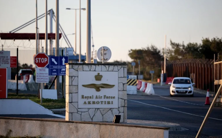 Aerial view of the RAF base in Cyprus, with a drone flying in the background, highlighting the growing concern over drone strikes on military bases