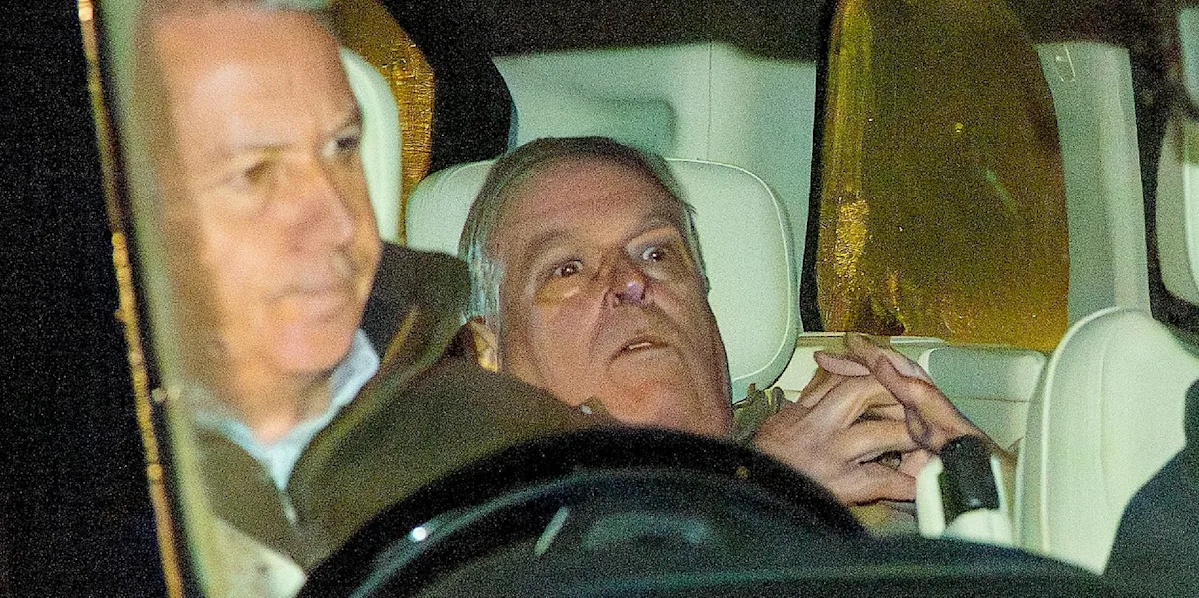 A photo of the royal family in a state of distress, with a deer-in-headlights expression, sparking controversy and debate about their behaviour and reputation as a symbol of the monarchy