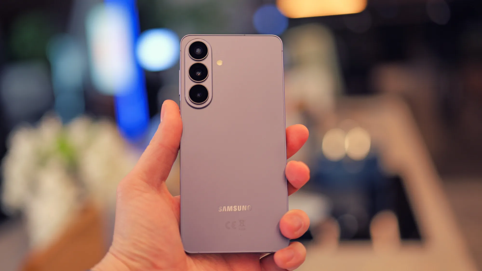 Samsung Galaxy S26+ featured image with a large 6.7-inch AMOLED display and sleek glass and metal finish, showcasing its premium design and AI capabilities.