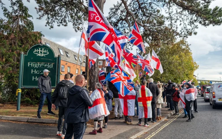 A woman walking alone near an asylum hotel, highlighting the need for improved public safety measures and community engagement to ensure women's safety and prevent similar attacks