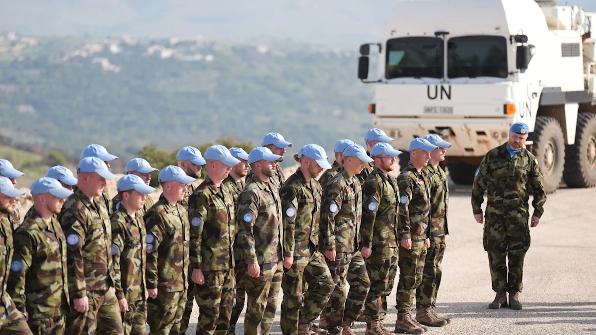 Aerial view of the Lebanon peacekeeping base, with a destroyed building and debris scattered around, highlighting the devastating impact of the reckless strike on the international peacekeeping efforts in Lebanon