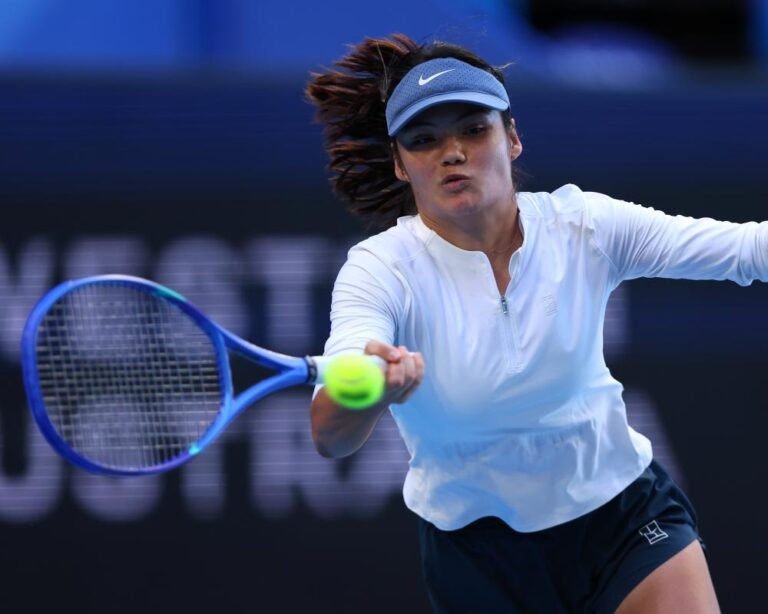 Emma Raducanu in action at the tennis court
