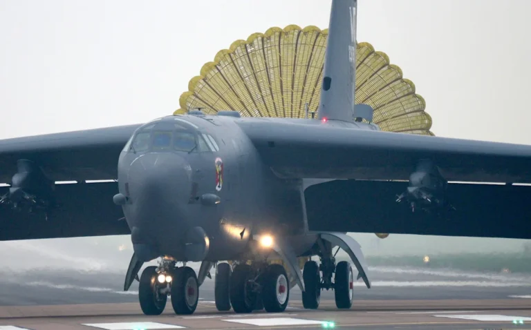 A US Air Force B-52 Stratofortress bomber lands at RAF Fairford, showcasing the base's strategic importance and the US Air Force's heaviest bombers, with the primary keyword being US Air Force