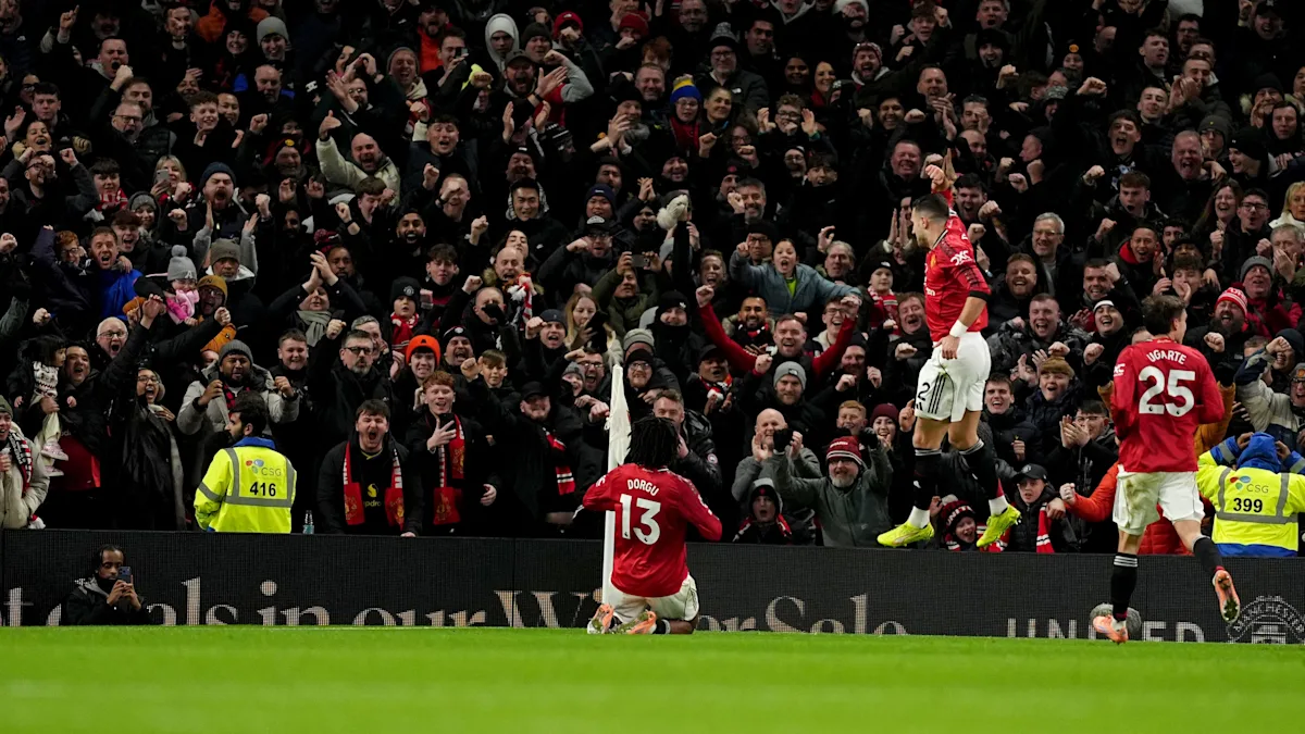 Manchester United players celebrating their win