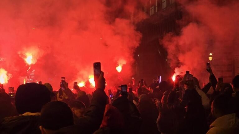 African football fans in Paris cheering