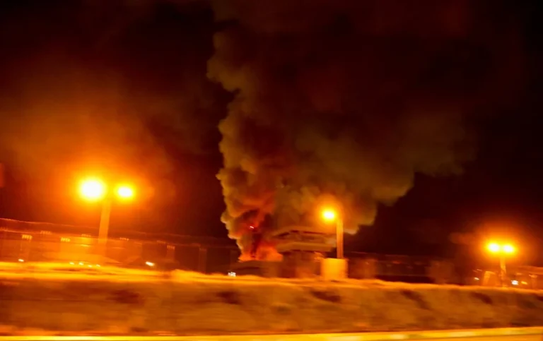 Iranian drone in flight, with a British military base in the background, highlighting the threat of drone attacks on British troops