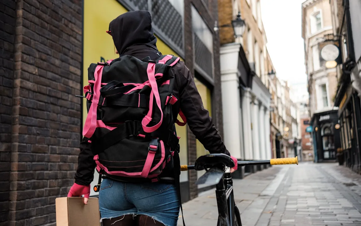 A group of migrant workers using fake IDs to work as delivery drivers in the UK, with a focus on the risks of exploitation and the importance of public safety, highlighting the need for stricter background checks and more effective ways to detect fake IDs