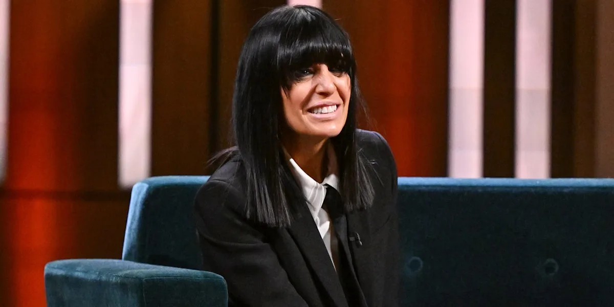 Claudia Winkleman smiles as she hosts her new show, surrounded by a colourful studio audience, the Claudia Winkleman Show is a new UK television programme that features entertainment and conversation, with a focus on celebrity interviews and games