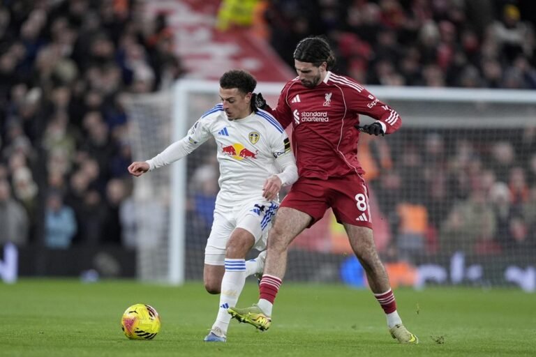 Leeds United players celebrating goalless draw