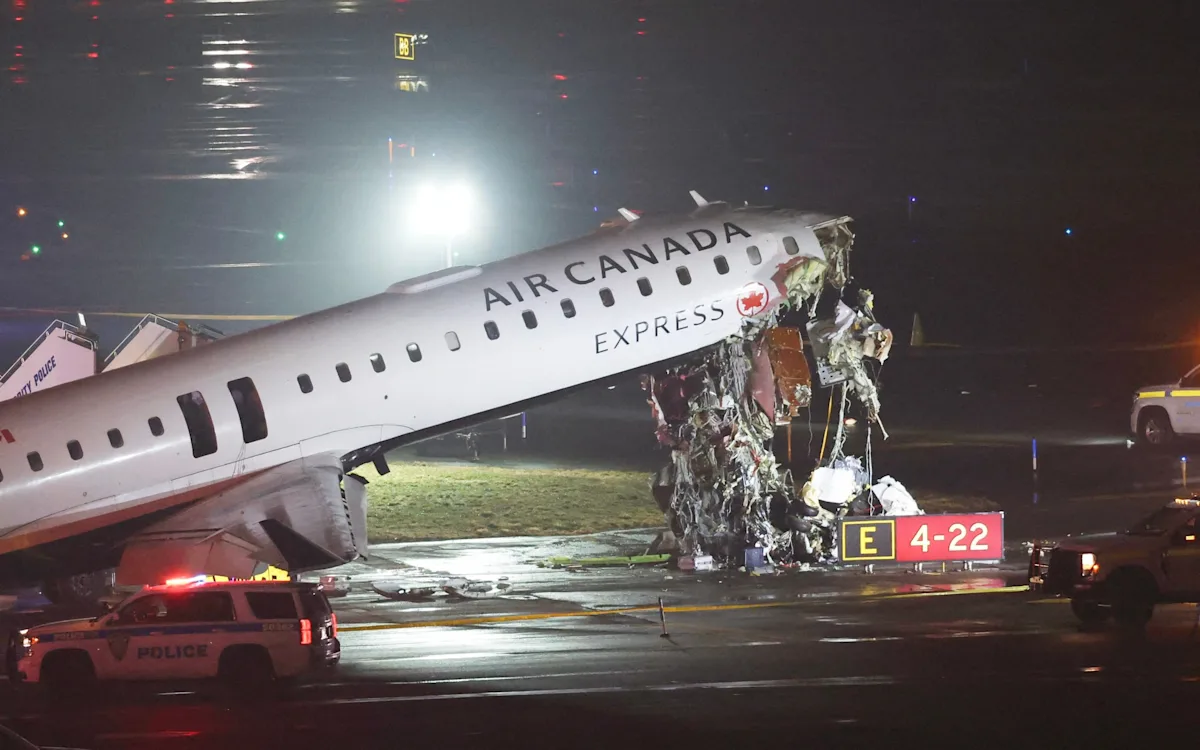 A plane collided with a fire engine at New York airport, resulting in the loss of lives of pilots, with the primary keyword being plane collision, and the image depicting the aftermath of the incident