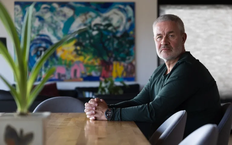 Denmark's flag waving in the wind, symbolising the country's commitment to democracy and human rights, and its stance against Trump's bullying behaviour