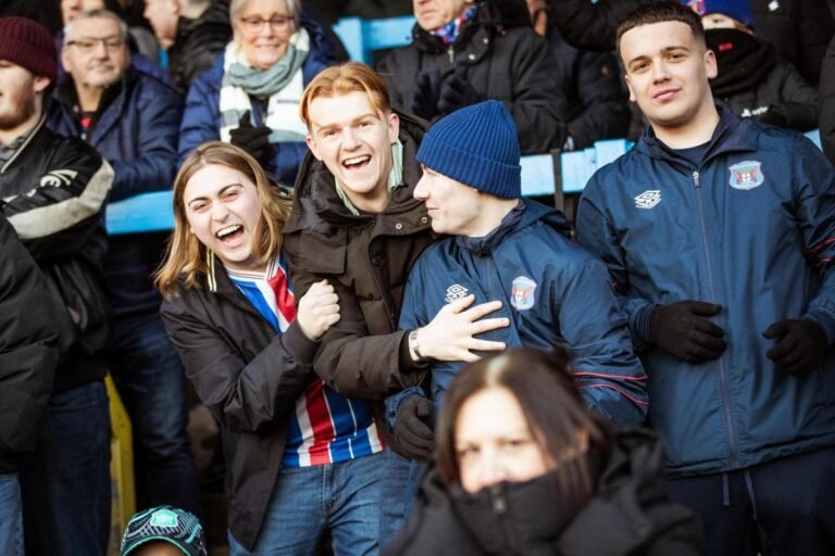 Carlisle United fans celebrating football win