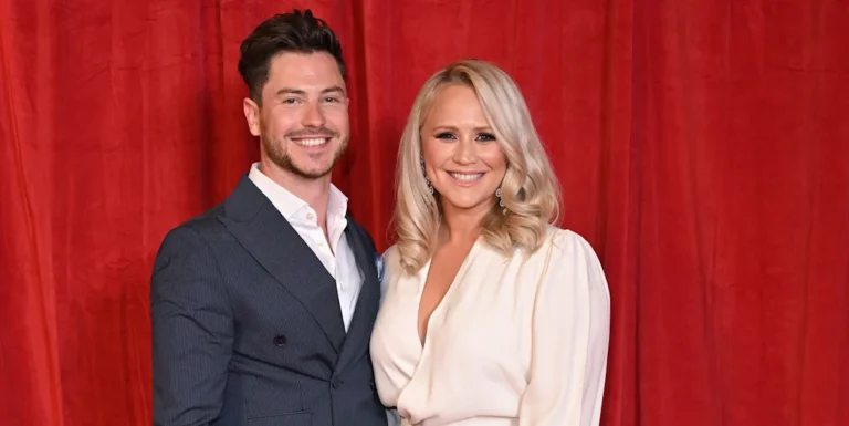 Toby-Alexander Smith, EastEnders star, smiling and holding a baby, surrounded by loved ones, with a colourful background, as he shares joyful family news