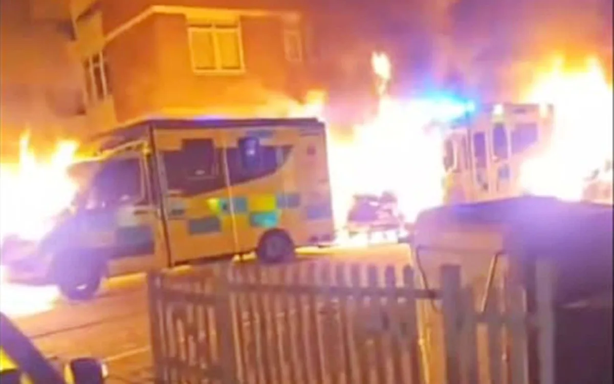 A photo of a vigil being held in support of the Jewish community, with people holding candles and signs condemning the anti-Semitic firebomb attack, a disturbing incident that has sparked widespread outrage and concern