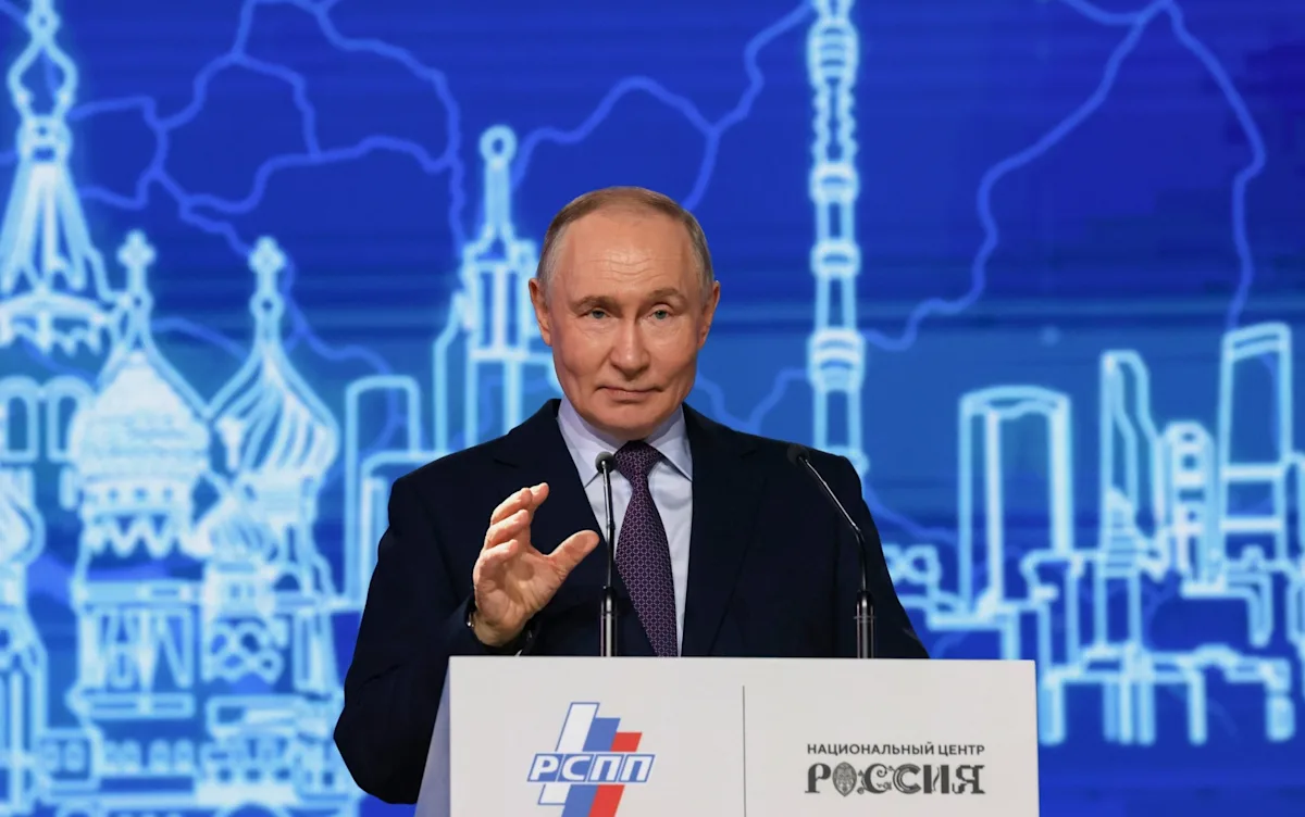 Ukrainian flag waving in the wind, symbolising the country's strength and resilience amidst the Iran war and conflict with Putin, with a subtle background colour of blue and yellow