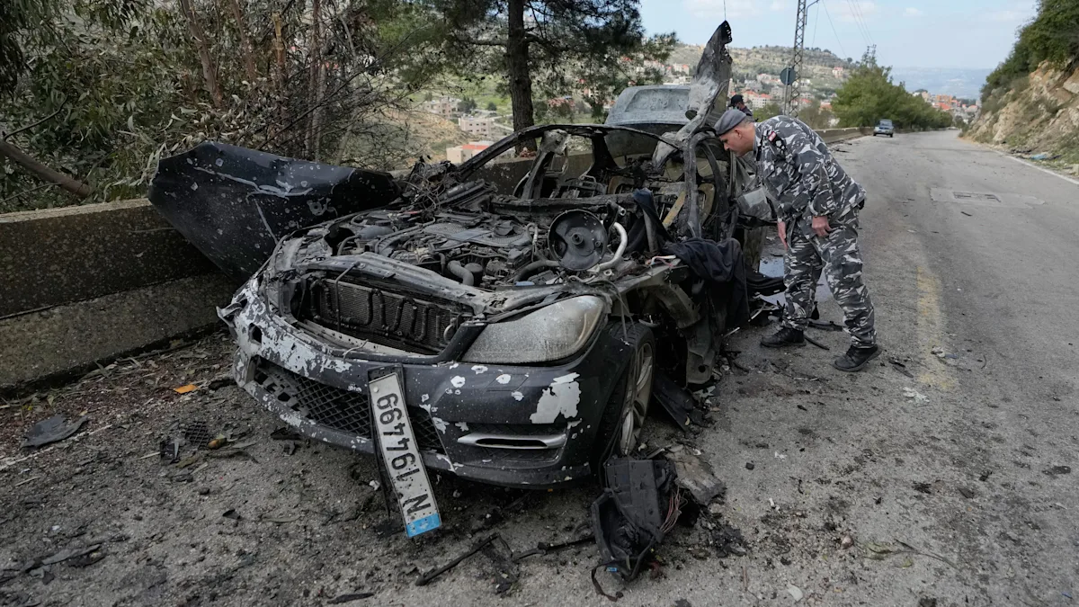 A photograph of a destroyed building in Lebanon, with a caption describing the aftermath of the Israeli airstrike that killed three journalists, who were covering the war in the region, and highlighting the dangers faced by journalists in conflict zones