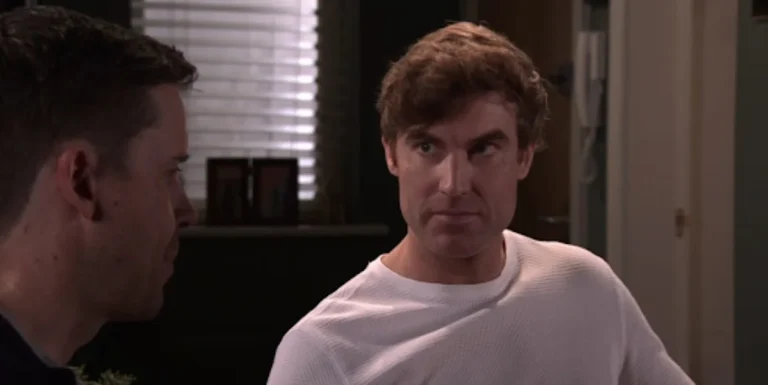 Coronation Street's Theo Silverton looks worried as he receives a threat from Gary, leading to his dramatic double exit from the show, a pivotal moment in the street's history