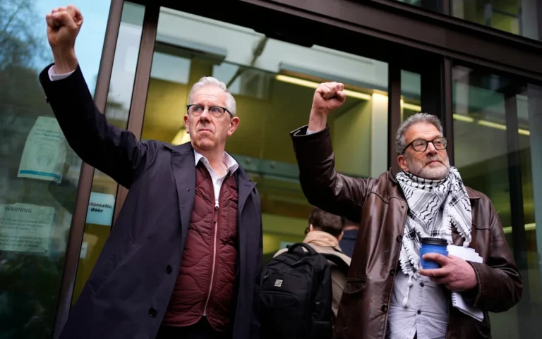 A group of pro-Palestine activists standing outside a synagogue, holding signs and banners in support of the Palestinian cause, with a mix of determined and respectful expressions on their faces, as they navigate the complex issue of balancing freedom of expression with respect for religious institutions