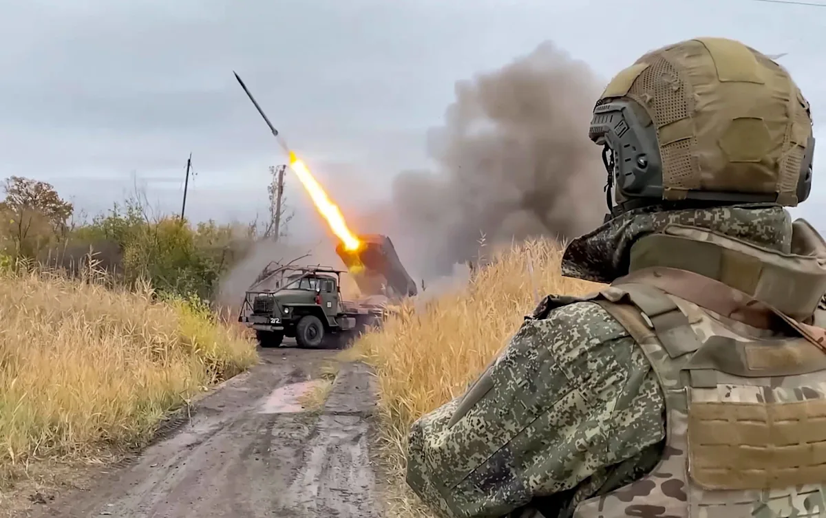 A descriptive image of a Russian army soldier, highlighting the primary keyword phrase 'Russian army atrocities' and the need for greater accountability and transparency within the military