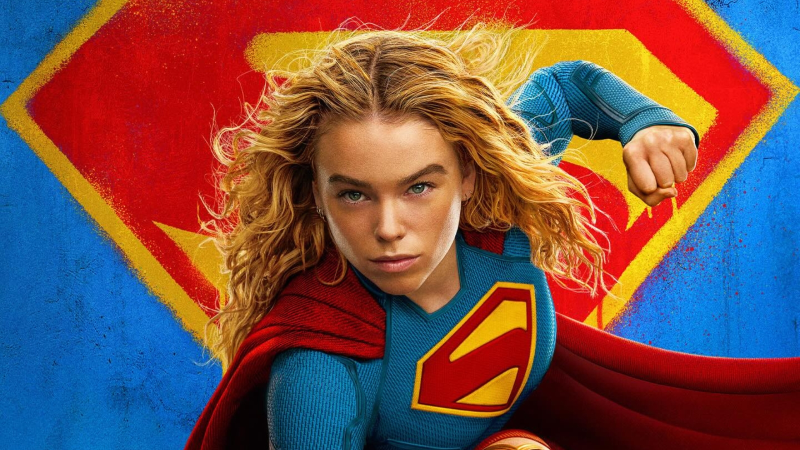 Supergirl standing heroically with her dog Krypto, set against a stunning cosmic backdrop, showcasing the film’s unique blend of action, adventure, and heart, with a colourful and vibrant visual style that promises an unforgettable cinematic experience