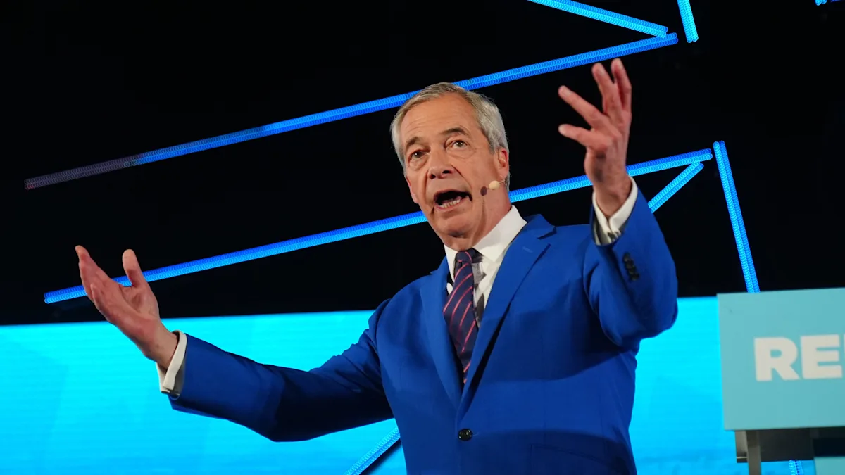 A photo of the Grenfell Tower memorial, with a crowd of people gathered to pay their respects, highlighting the importance of respectful behaviour and comments from public figures, particularly in relation to sensitive topics like the Grenfell Tower disaster