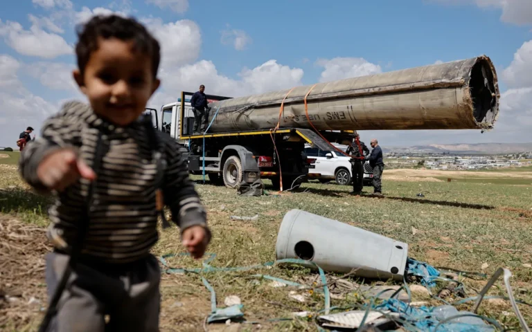A descriptive image of Iran's missile launchers, highlighting the primary keyword of US intelligence and the country's military behaviour, with a focus on the colour and complexity of the situation, as experts analyse the potential threats and the need for careful consideration and diplomacy