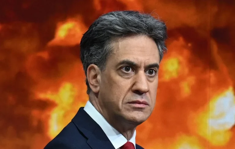 A scenic view of a wind farm, symbolising the UK's shift towards renewable energy sources and a reduction in fossil fuel consumption, in line with net zero policies