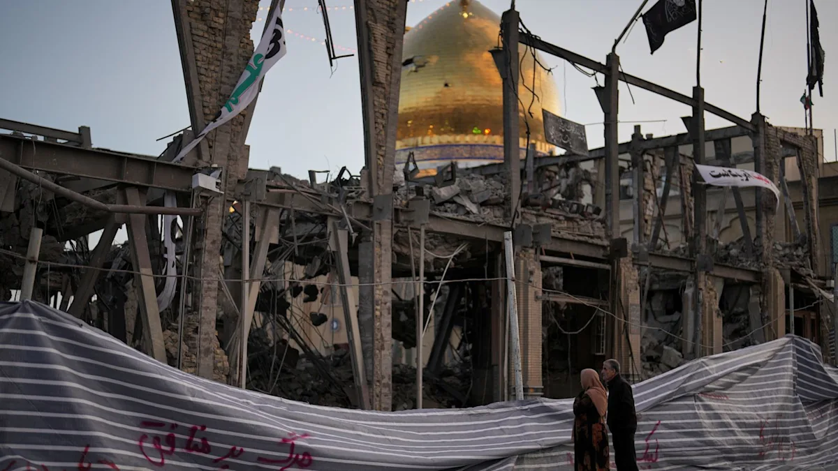 ITV News reporter in Iran, surrounded by people and buildings, with a subtle hint of hope and uncertainty in the air, as the country considers a ceasefire deal, a significant development in the ongoing Middle East tensions