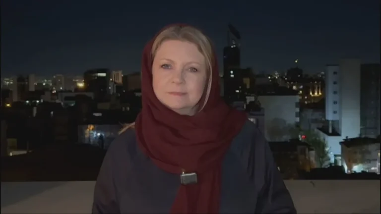 ITV News reporter stands in front of a crowded street in Iran, with a mixture of anxiety and defiance on the faces of the people, as the deadline imposed by the Trump administration approaches, sparking a sense of uncertainty and tension in the air