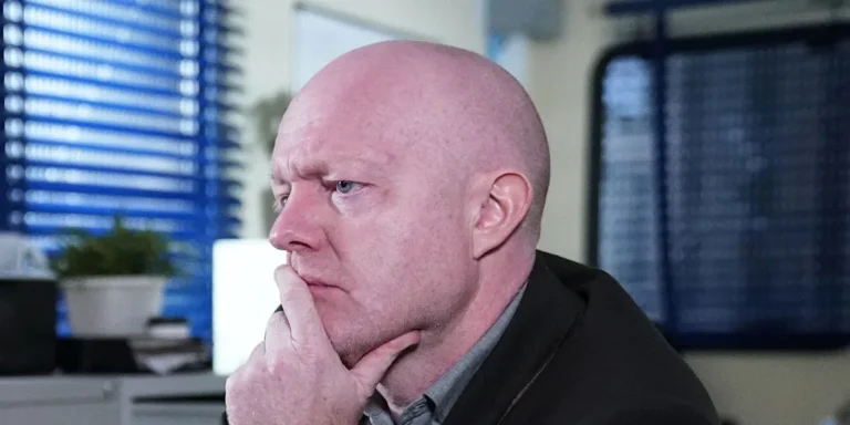 The Branning family standing together, looking serious and concerned, with a dark and ominous background, representing the drama and tension in their storyline, with a focus on Max Branning