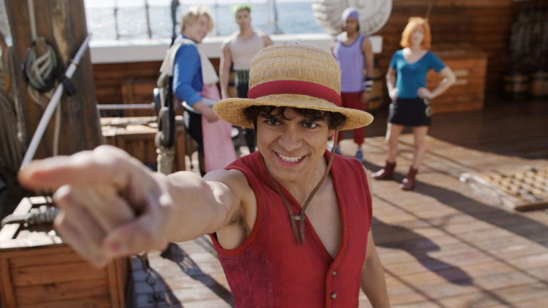 One Piece Season 3 featured image, showing Monkey D. Luffy and his friends in action, with a desert landscape in the background, highlighting the show's unique blend of action, adventure, and humour, set in the UK's favourite anime series.