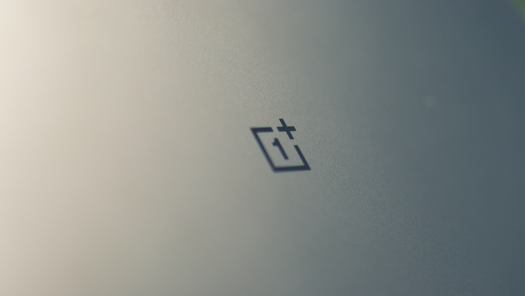 OnePlus gaming handheld console with a thick body, exaggerated hand grips, and physical shoulder buttons, featuring a pair of cameras on the back, set to take on the UK gaming market with its new Dimensity processor-powered device