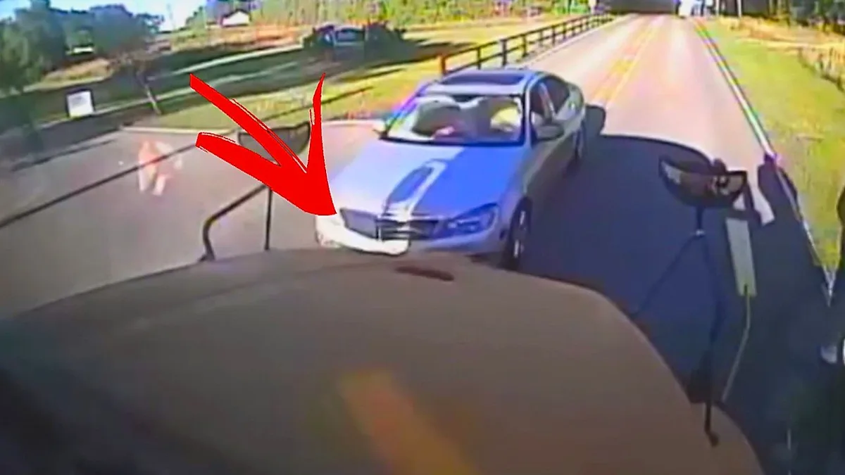 A school bus damaged after being smashed into by a driver who fled the scene, highlighting the importance of road safety and responsible driving around schools, with a focus on the colour and design of school buses and the behaviour of drivers