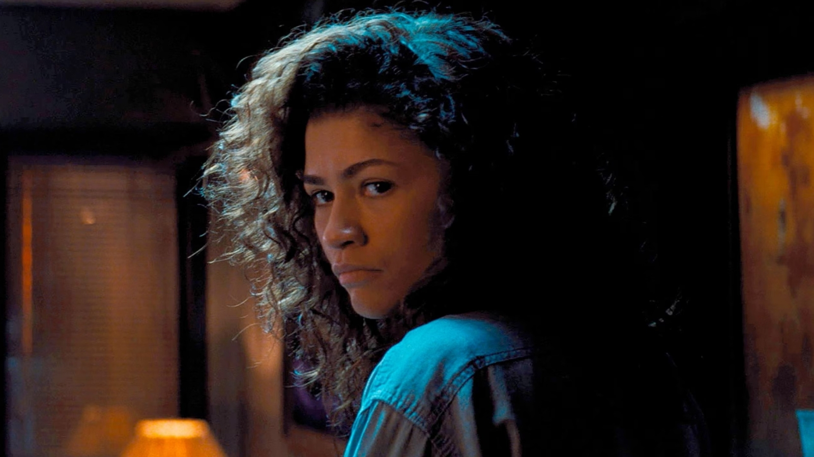 Euphoria season 3 poster featuring Zendaya and the main cast, with a colourful and eye-catching design that showcases the show's unique style and energy