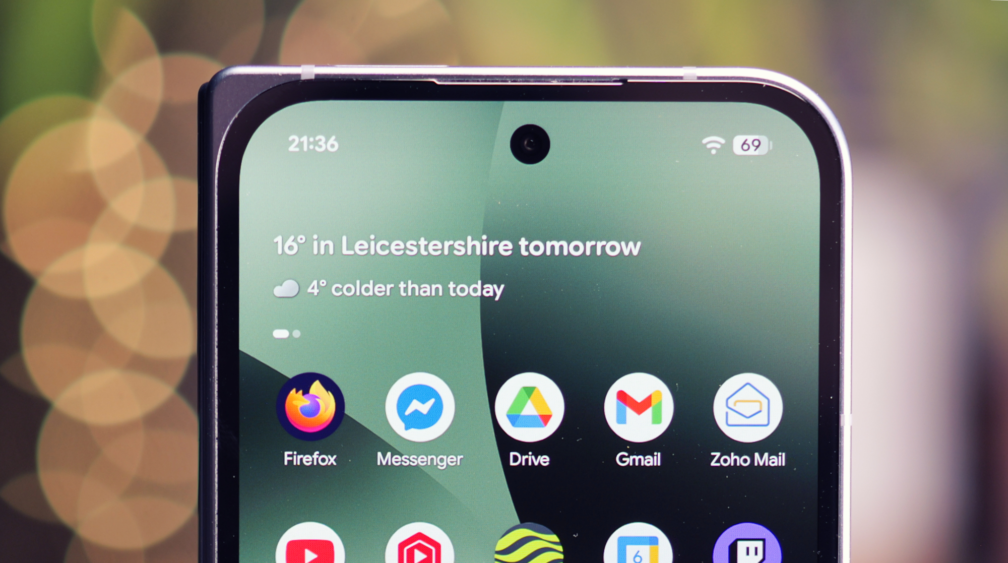 A Google Pixel phone with a low battery icon, representing the battery drain issue affecting UK users, with a colour scheme of black and white, highlighting the need to analyse and resolve the problem