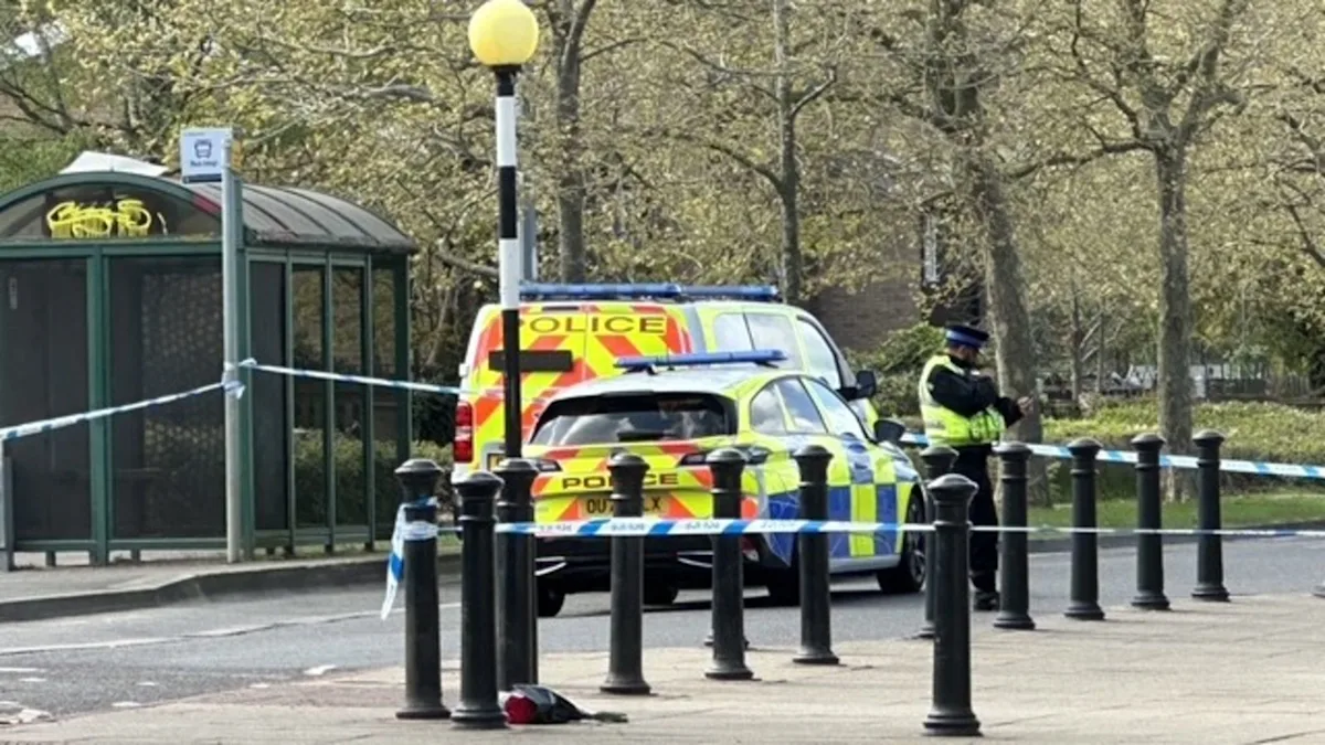 A sombre and reflective image of a community coming together to mourn the loss of a life, with a focus on the fatal stabbing incident that has left two teenagers facing murder charges, a tragic event that will have a lasting impact on the community
