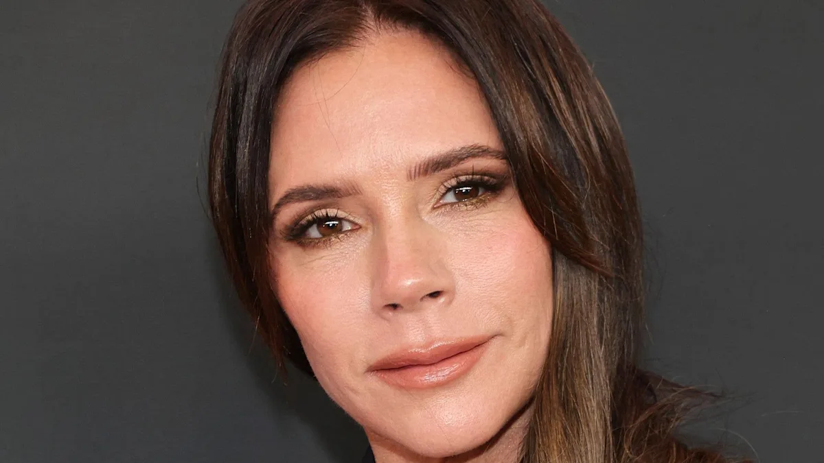 Victoria Beckham with son Brooklyn, a famous celebrity family with a strong bond, experimenting with hair colour and style, former Spice Girl and fashion designer