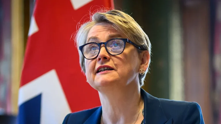 Iranian flag waving in the wind, symbolising hope for peaceful resolution as ceasefire deadline approaches, with diplomats working tirelessly to broker agreement
