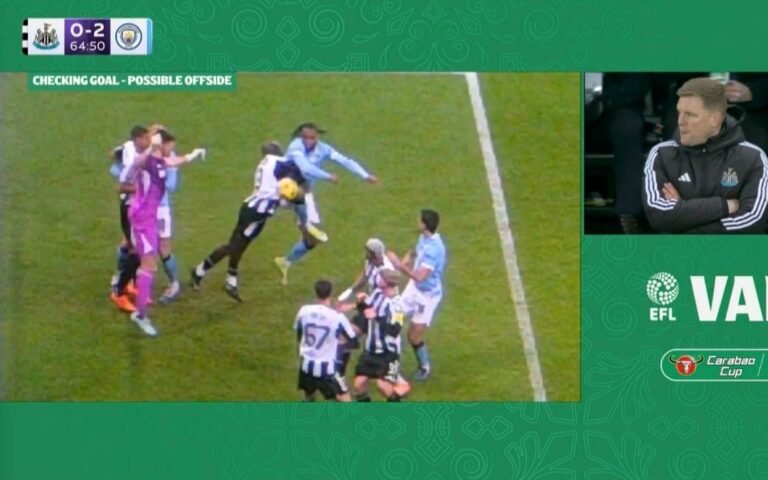 Pep Guardiola argues with referee