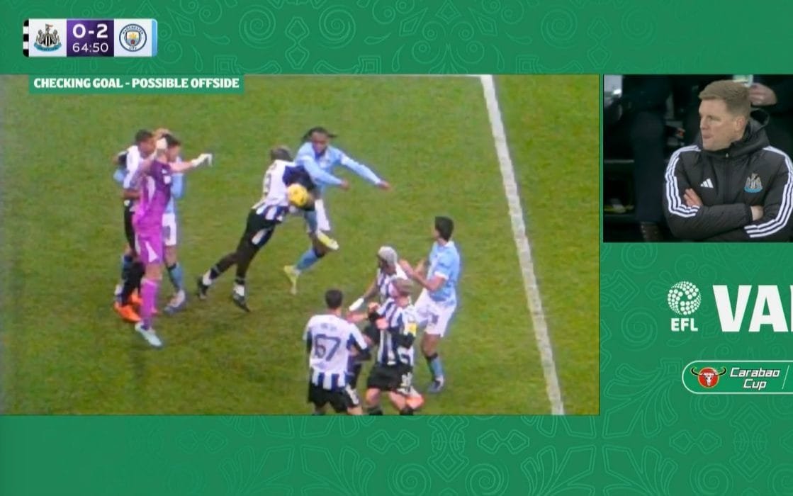 Pep Guardiola argues with referee