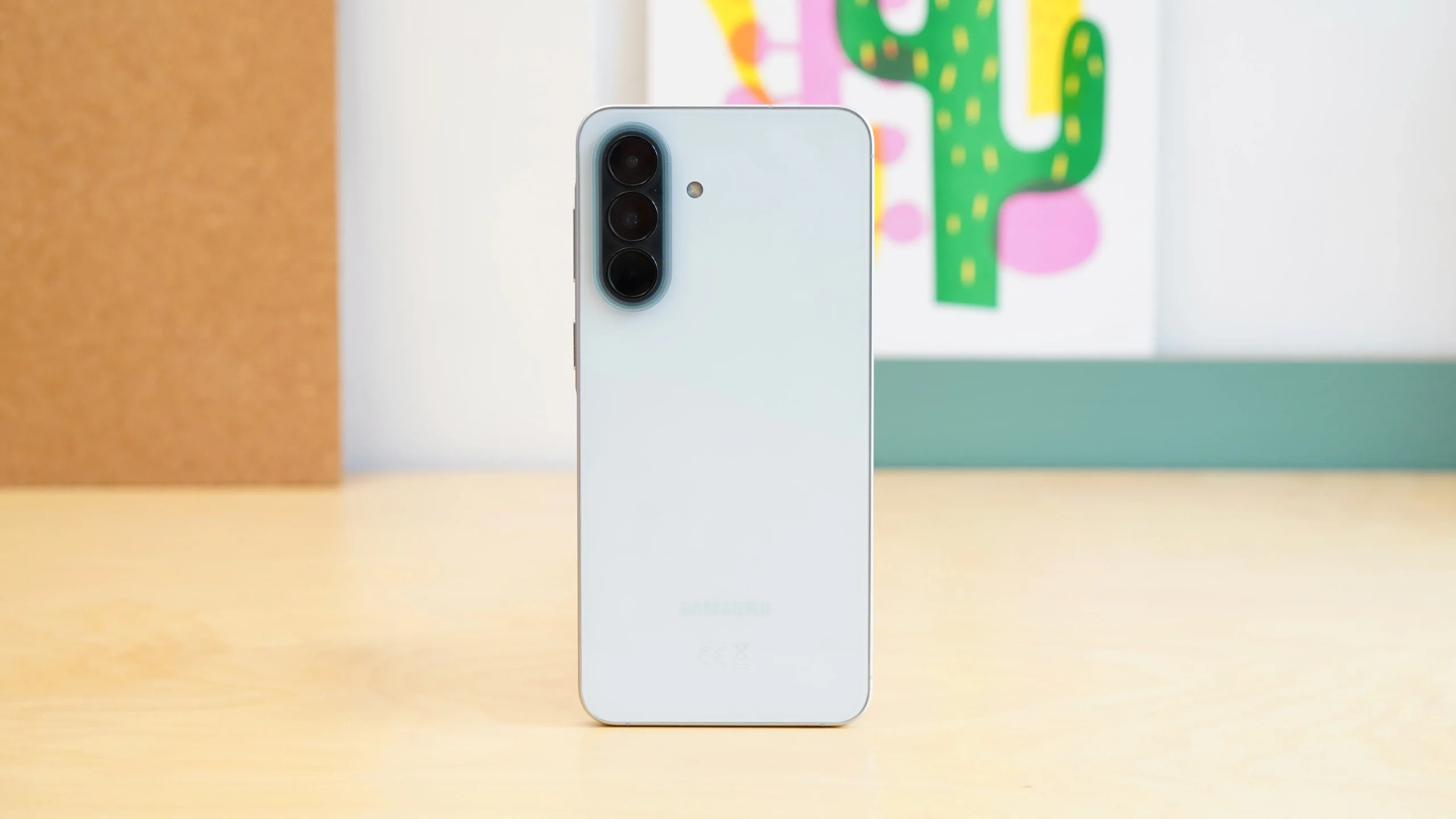 The Samsung Galaxy A57 and Google Pixel 10a side by side, showcasing their unique designs and features, with a focus on the Google Pixel 10a